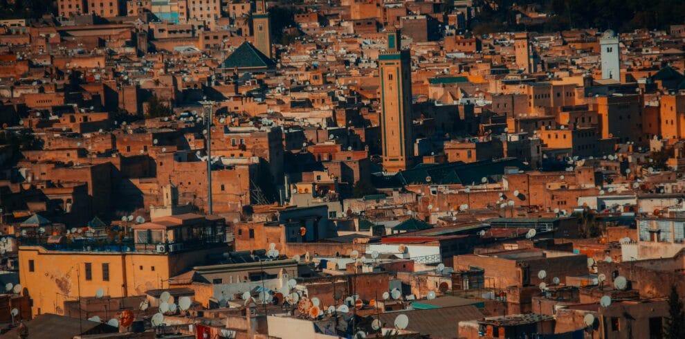 Camel trek in Erg Chebbi dunes at sunset on 4 days tour from Marrakech to Fes